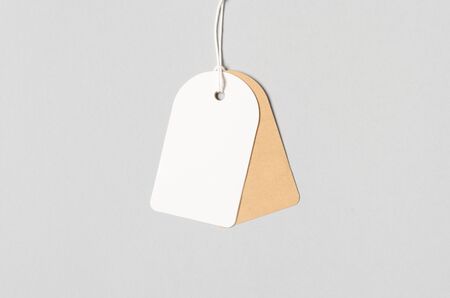White and kraft clothing tag, gift tag mockup.