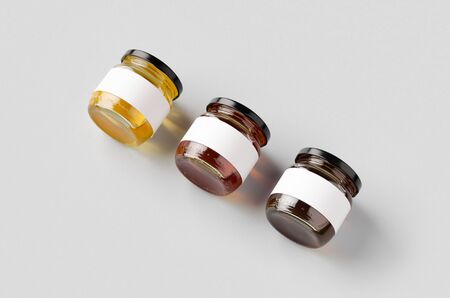 Honey jars mockup with blank label. Three different colors.の写真素材