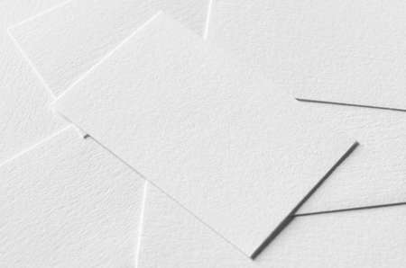 Textured business card mockup on a grey background.  85x55 mm.の写真素材