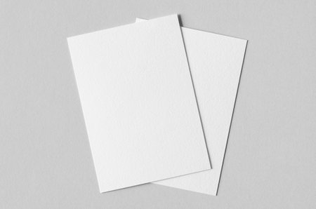 Textured A6 invitation card or flyer mockup, portrait orientation.の写真素材