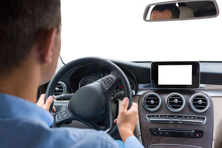 Inside of the car on the isolated background. View from inside car. The man driving the car.