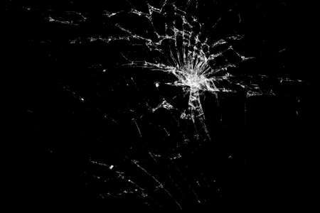 Broken glass - white lines on black background, design element. Broken glass smartphone.の写真素材