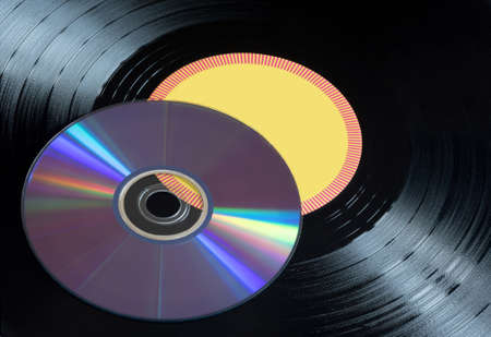 Vinyl records and CDs disks close up.の写真素材