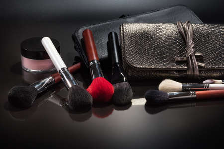 Brushes for a make-up on a black background. Cosmetic set.の写真素材