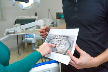 Dental X-rays and hands.の写真素材