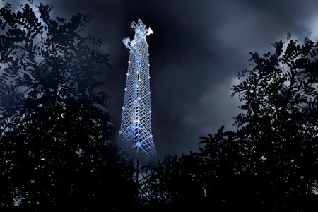 Large cellular communications tower at night. Radio antenna tower.の写真素材