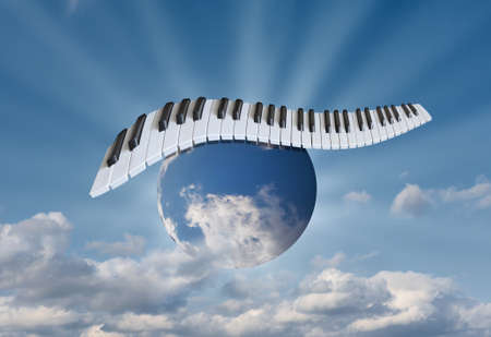 Piano keys in the sky on the globe.の写真素材