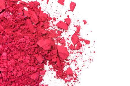 Red eye shadows on a white isolated background.A sample of a cosmetic product for facial skin, close-up.の写真素材