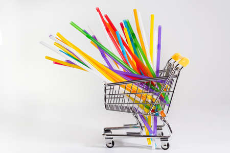 Plastic tubes for drinks in a shopping cart.の写真素材