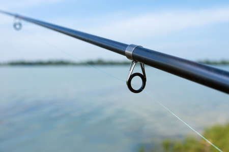 Fishing rod details close up. Sport fishing. Leisure.