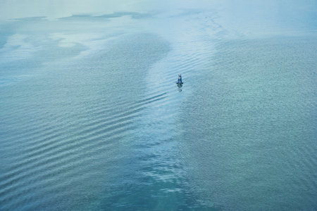 Polluted green river water, polluting nature and the environment. Toxic bacteria, hazardous waste. The concept of environmental problems.の写真素材