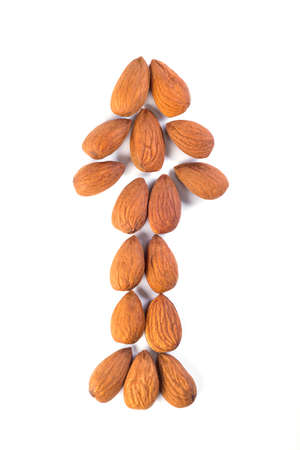 Nuts on white background. Almonds, healthy food, arrow symbol, top viewの写真素材