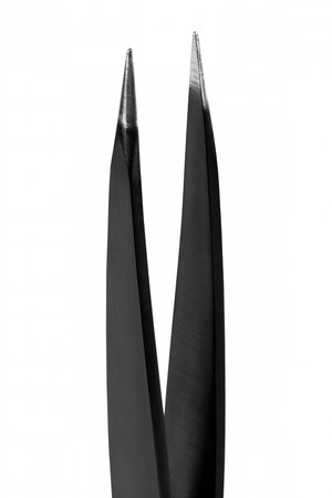 Professional tweezers close-up isolated on white. Body care. Beauty conceptの写真素材