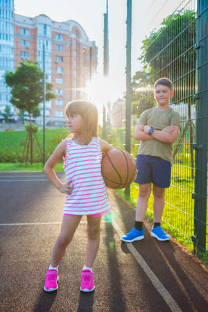 Children on the playground playing basketball. Healthy lifestyle and sport concepts.の写真素材