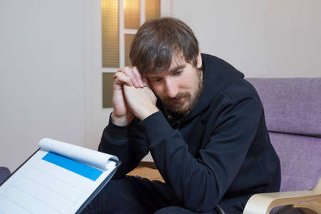 The man in the psychologists office shares with his problems. Social problems. Healthcare concept.の写真素材