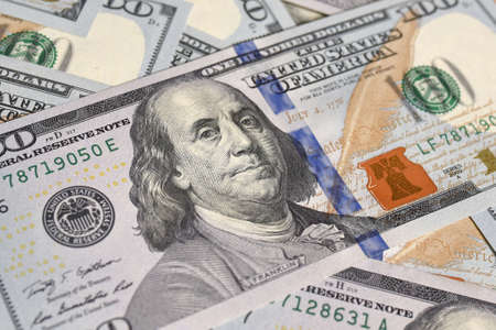 Background from 100 US dollar bills close up. Money background. Banking and financial concept.