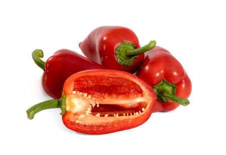 Red fresh chopped peppers on a light white backgroundの写真素材