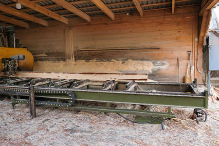 Equipment for processing and sawing wood at a sawmill. Timber industryの写真素材