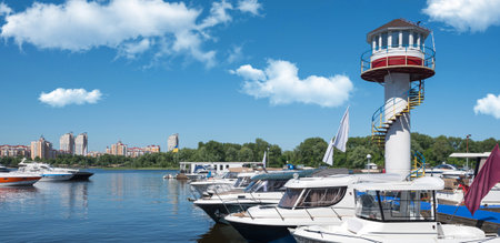Kiev, Ukraine - June 01, 2018 : Yachts docked in city port. river parking of modern motor boats and blue riverのeditorial素材