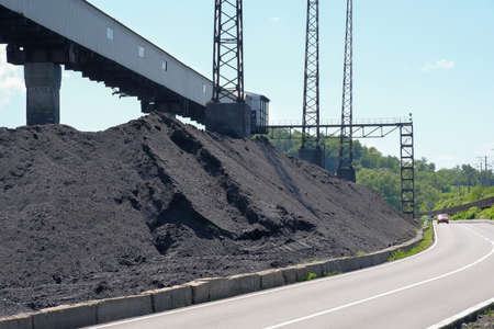 Heaps of coal. Storage and facilities of the coal industry
