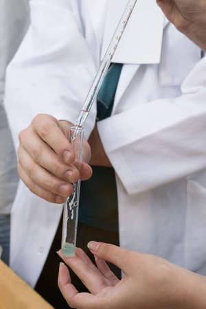 Doctors work with test tubes in research laboratories