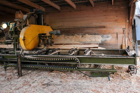 The process of processing wood at an old sawmill, side viewの写真素材
