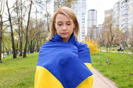 Outdoor portrait of a Ukrainian girl outdoors in the park. Free lifestyleの写真素材