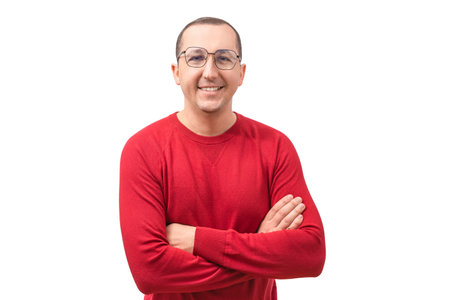 Portrait of a happy young man looking at the camera on a white background. Success conceptの写真素材