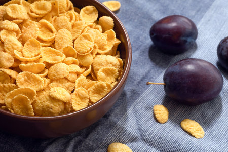 Healthy corn flakes for breakfast with fruitの写真素材