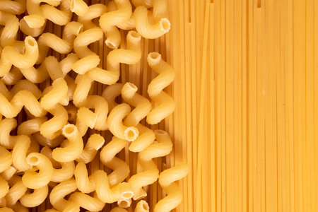 Raw pasta and spaghetti, top view. Italian raw pasta mockupの写真素材