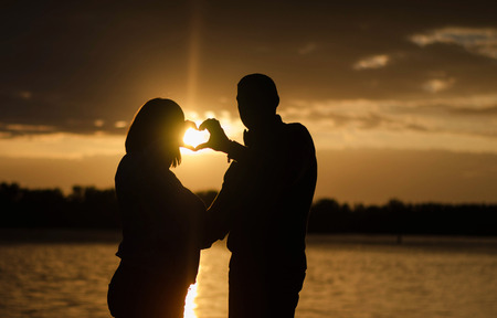 Love date at sunsetの写真素材