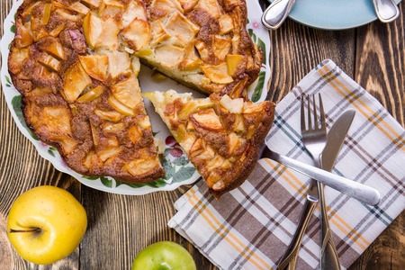 Homemade Organic Apple Pie Dessert Ready to Eat on brown wood backgroundの写真素材