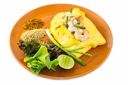 Omelet with vegetables and shrimp. Thai traditional food. Isolated on white.の写真素材