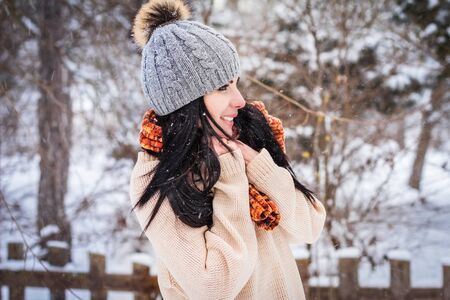 Close-up of a woman having fun in a winter parkの写真素材