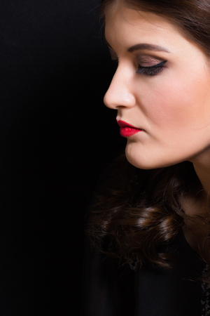 Portrait of a woman with red lipstick closeupの写真素材
