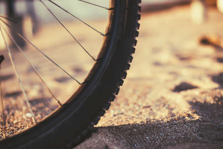 A wheel of a bicycle. Blurred background. Close-upの写真素材