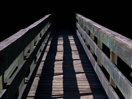 Wooden bridge in high contrast sceneの写真素材