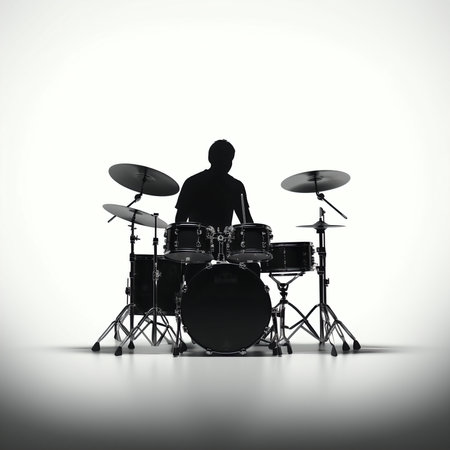 Silhouette of a man playing drums on a white background.の素材