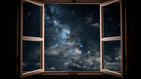 Night sky with stars and clouds as seen through the open window.の素材