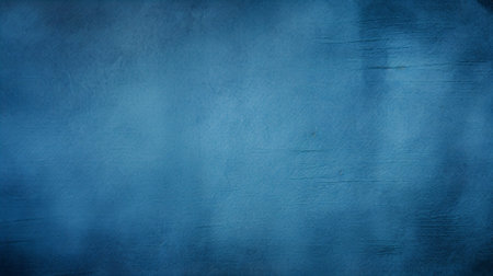 Blue grunge textured background with space for your text or imageの素材