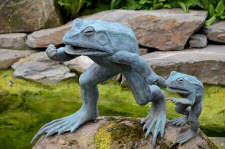 Sculpture of a funny frog の写真素材