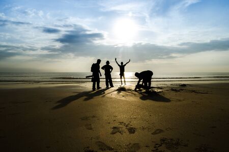 Silhouette of fishermenの写真素材