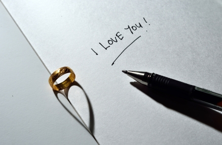  Ring with heart shadow and I love you text with penの写真素材