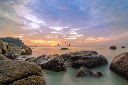 Beauty landscape with sunrise over seaの写真素材