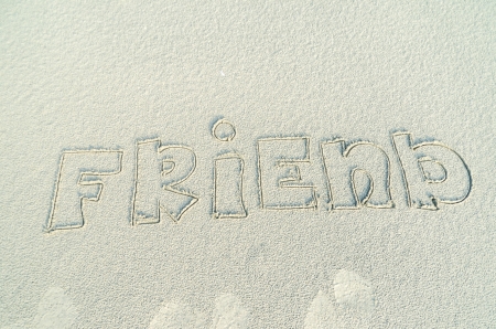 Friends text on sandの写真素材