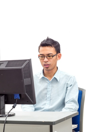 Man doing his works at personal computerの写真素材