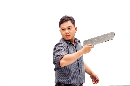 Angry business man throwing away file folderの写真素材