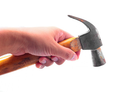 hand holding hammer isolated on white background