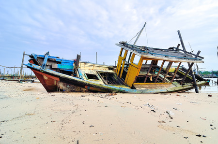 Abandoned boat at boat jettyの写真素材