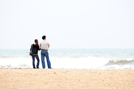 Picture of romantic young couple on the sea shoreの写真素材
